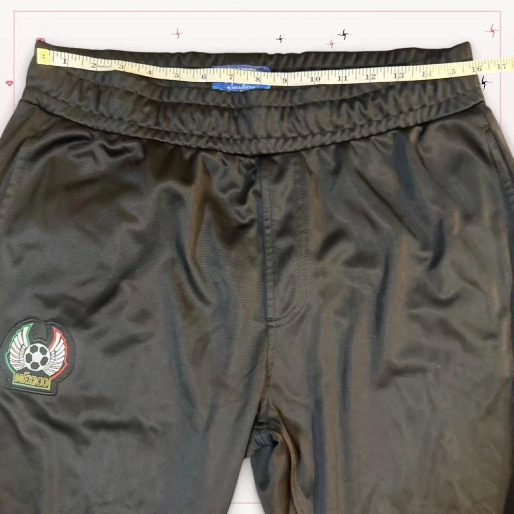 Sleek black Mexico track pants